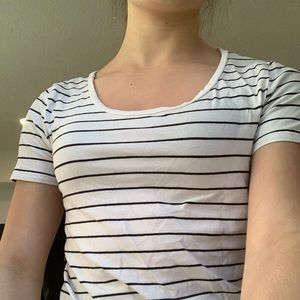 White tee shirt with black horizontal stripes.